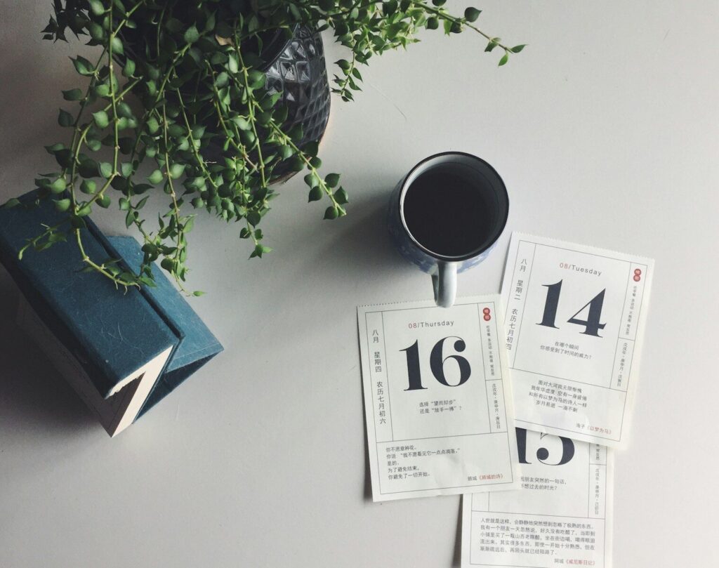 a cup of coffee sitting on top of a table